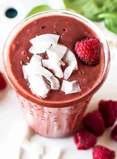 Raspberry smoothie with shredded coconut on top
